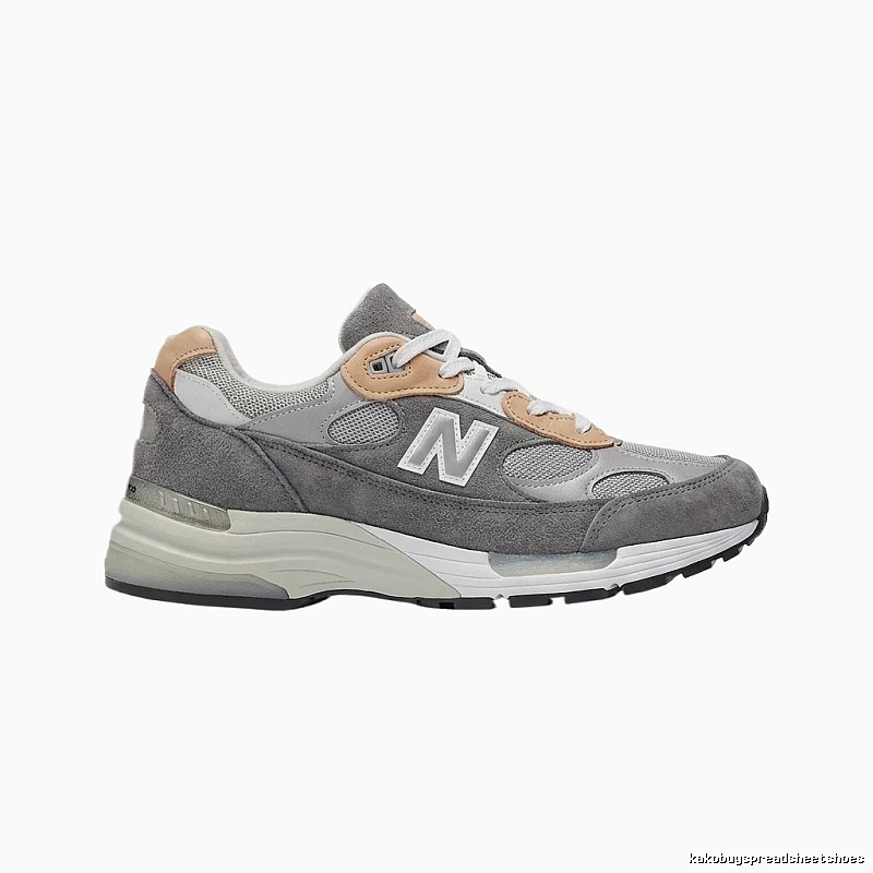 New Balance retro gray-brown athletic shoes.