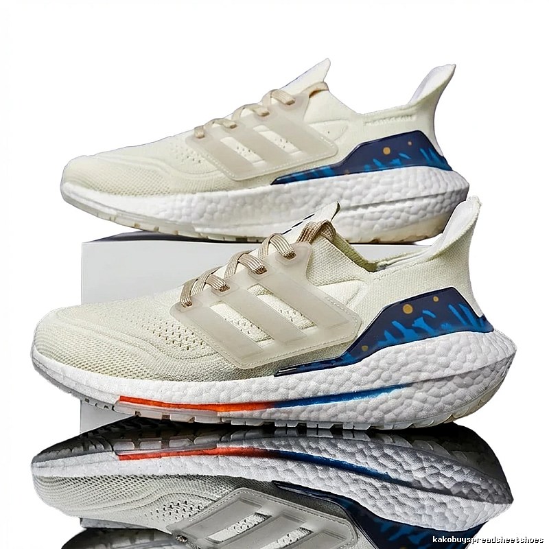 Adidas retro-style white and blue sports shoes