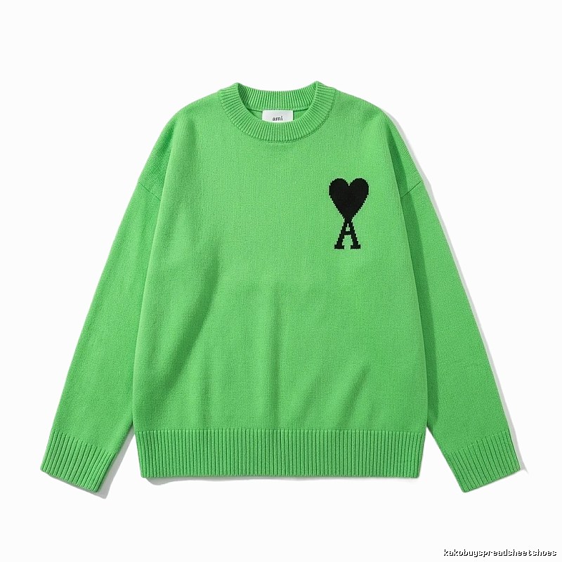 AMIRI's trendy and cool green sweater with a heart pattern.