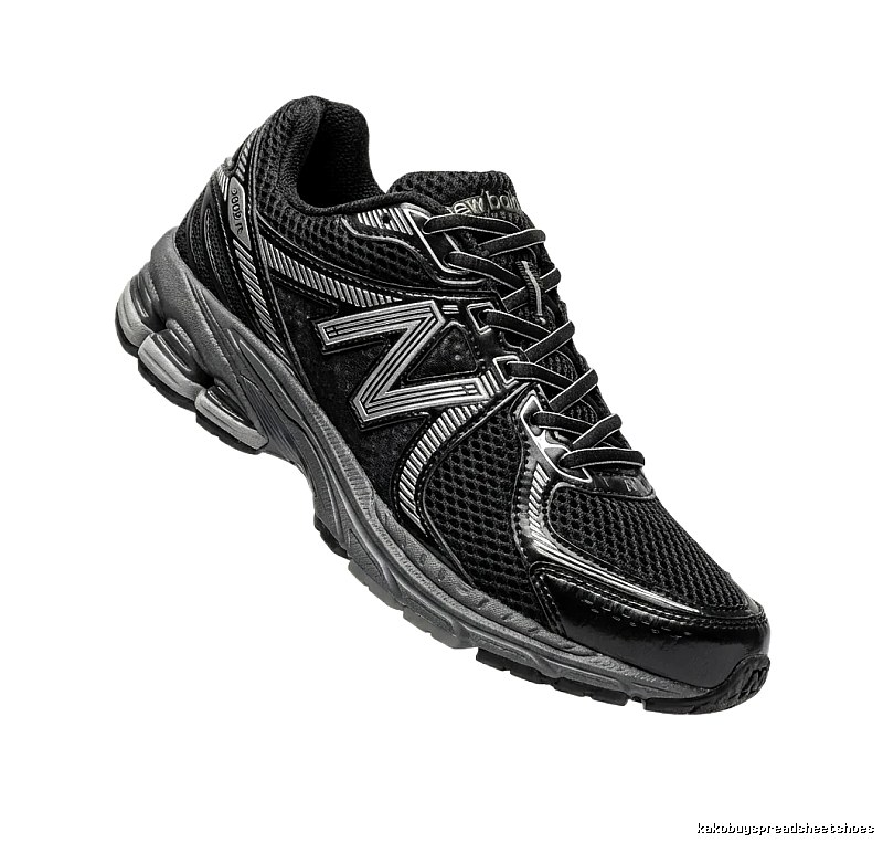 New Balance retro-style black and grey sports shoes