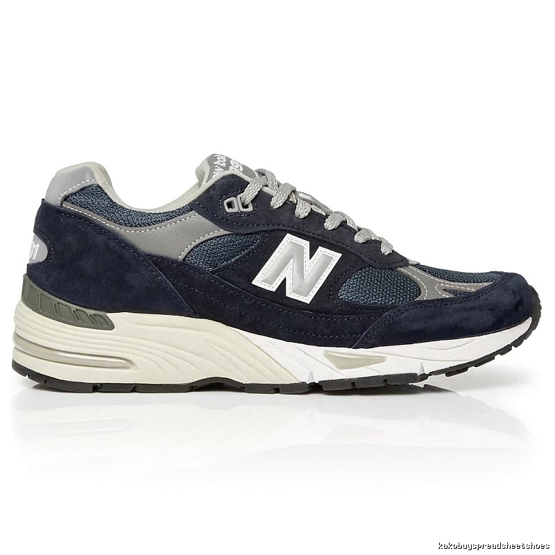 New Balance retro-style dark blue and grey sports shoes