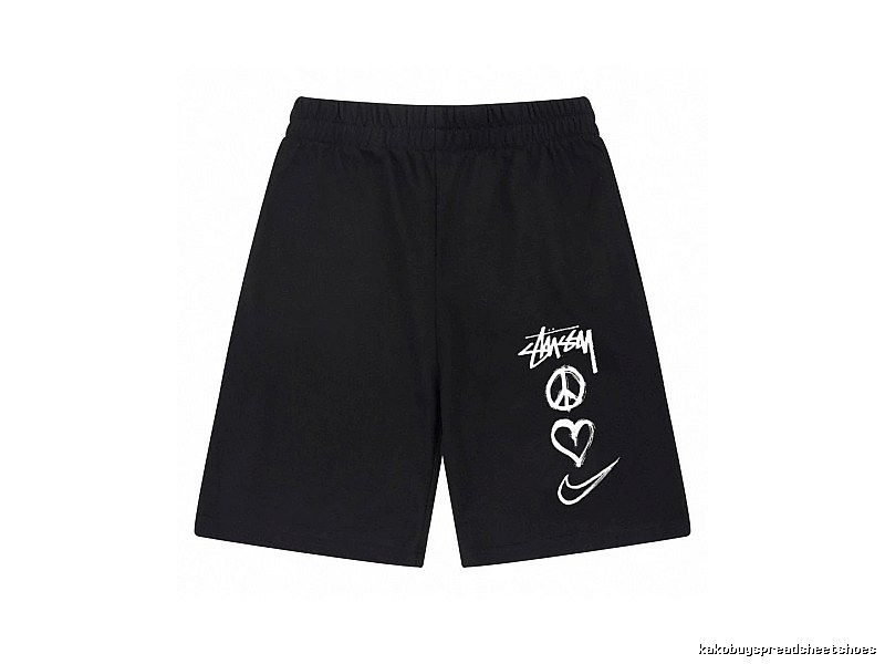 Stussy graffiti-style black shorts