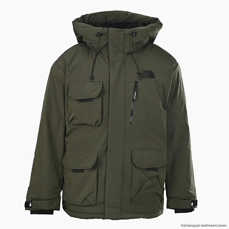 The North Face Utility Hooded Parka with oversized flap pockets and a structured outdoor silhouette - Layering