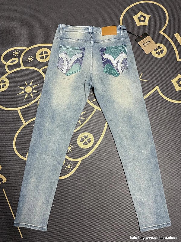 Travel Light Blue Evisu Graphic Jeans